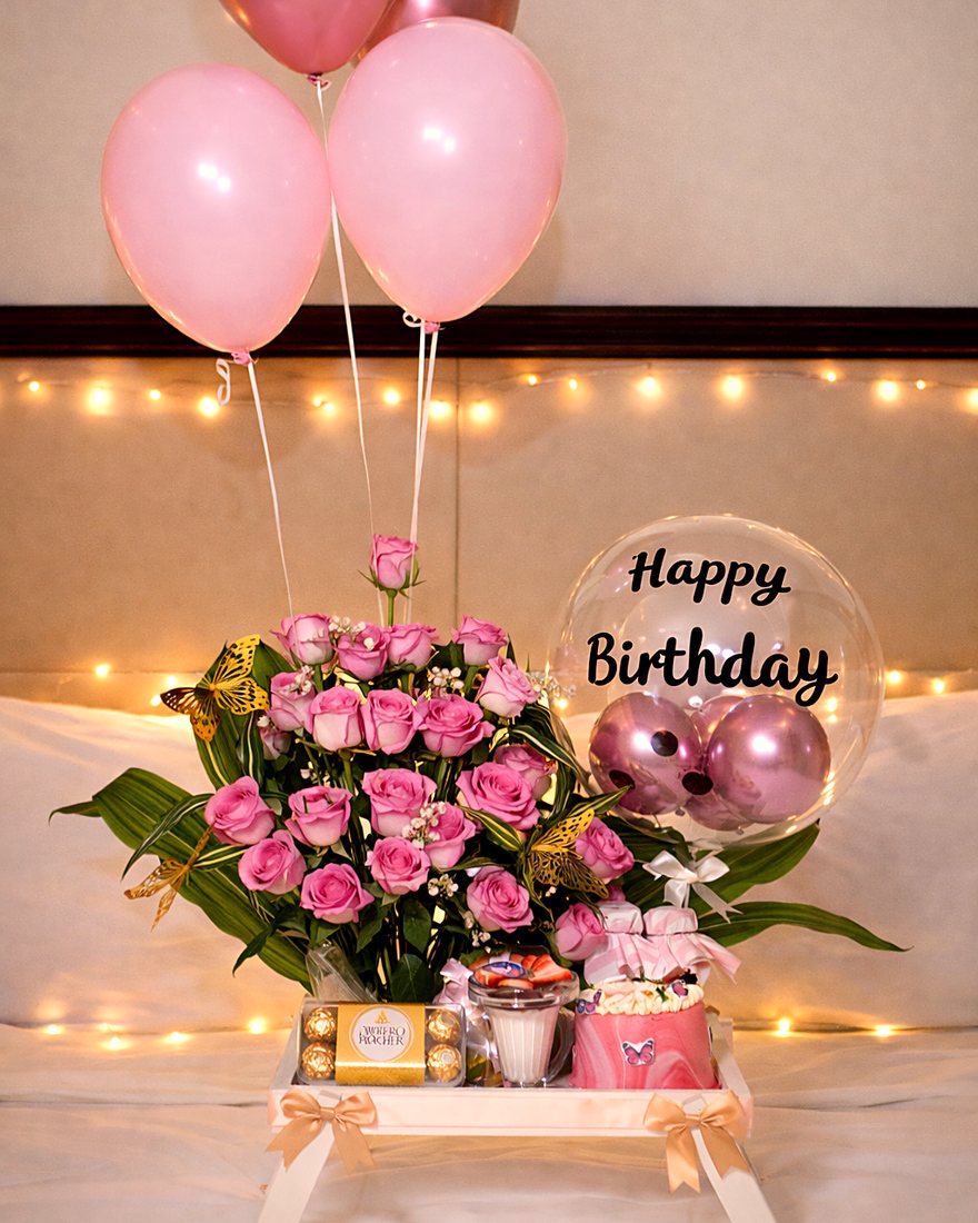 Birthday tray with pink roses, balloons and treats